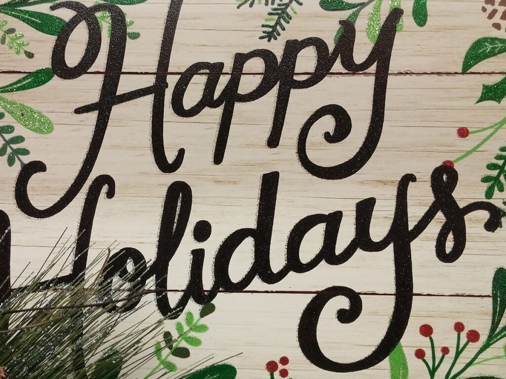 Image of a sign that says Happy Holidays