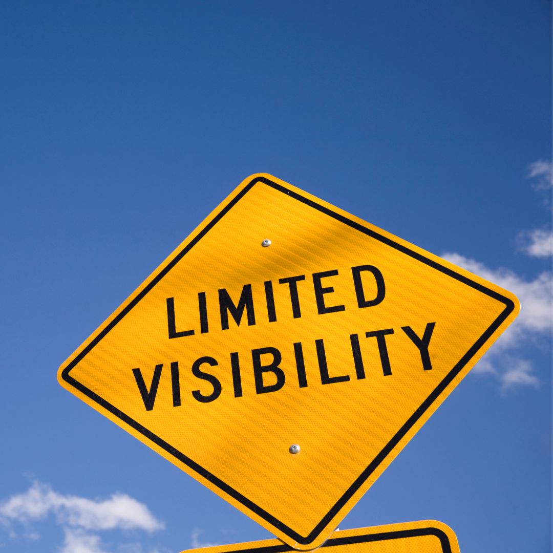 Yellow "limited visibility" sign. 