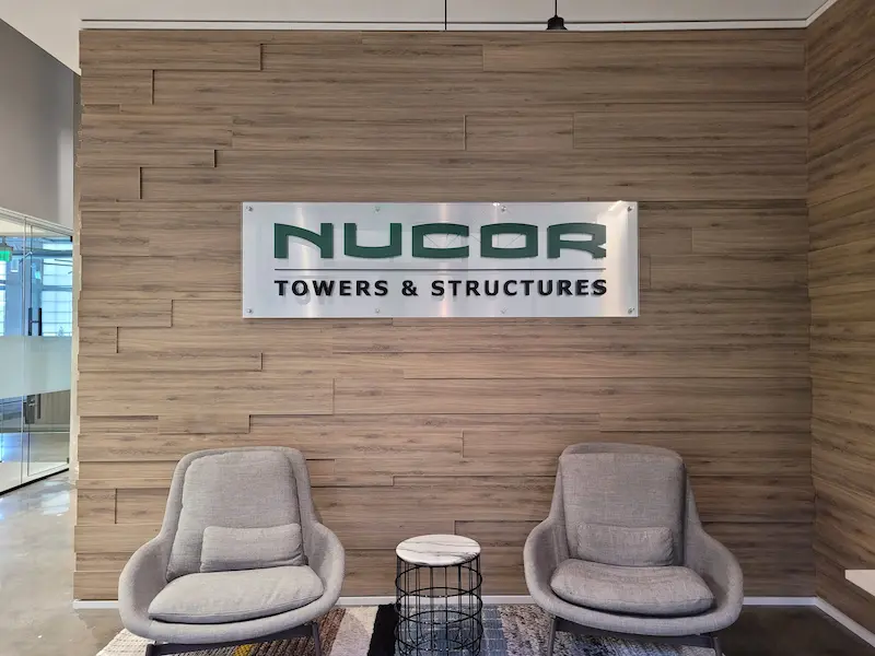 Lobby Sign Lobby Sign reading "Nucor - Towers & Structures"