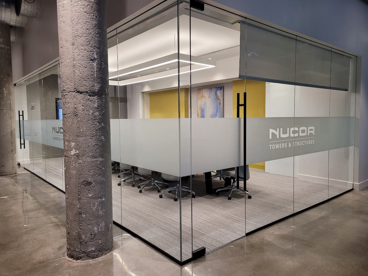 Nucor glass graphics